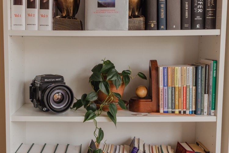 Maybe you can declutter a bookcase or add a picture of a loved one. 